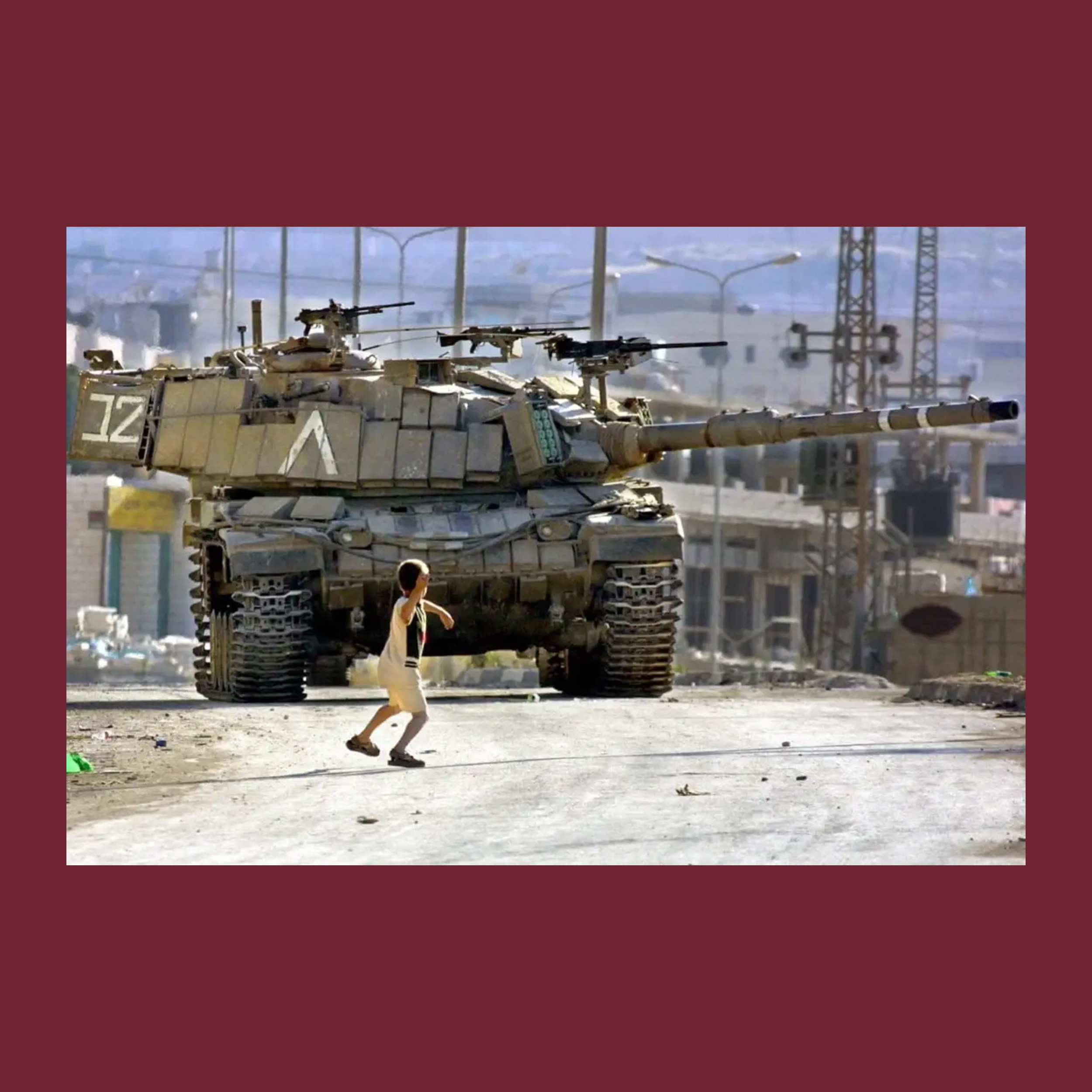 a child, a stone, a tank